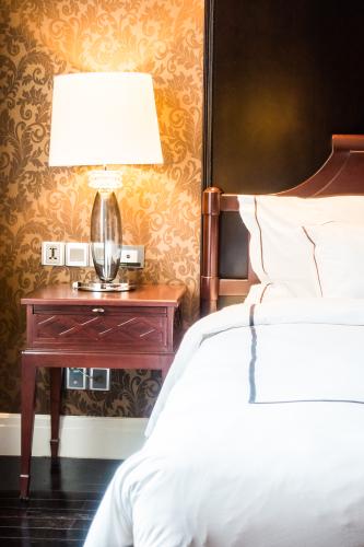 hotel-room-with-lit-lamp